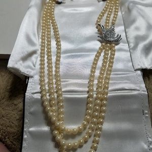 Prescella Presley three strand pearl necklace